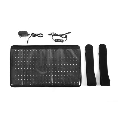 Zwartwit overzicht inhoud, roodlichtmat, koord met bediening, aansuitsnoer en 2 straps